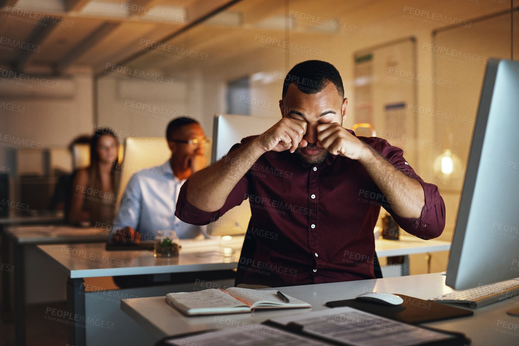 Buy stock photo Tired, businessman and night with desktop, fatigue and working late in project management. Male person, exhausted and technology with eye strain as creative web designer in coworking space or office