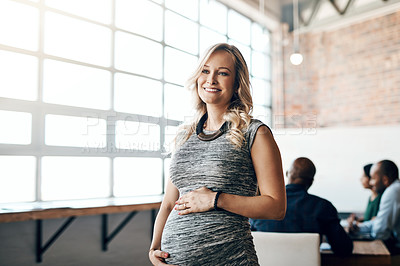 Buy stock photo Pregnant business woman leader, working and smiling in a modern office during a meeting. Having one last meeting before her maternity leave starts. Happy confident and attractive mother to be.
