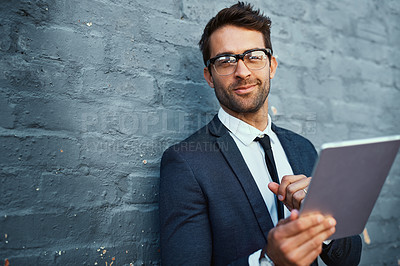 Buy stock photo Tablet, businessman and portrait with confidence, pride and suit as accountant finance agency. Male person, financial consultant and researching for investment opportunity with tech on gray wall