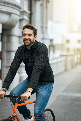 Buy stock photo Man, employee and satisfied with riding bicycle in city at sidewalk for transportation and commute in Italy. male person, outdoor and smile on bike for cartoon footprint, eco friendly and environment