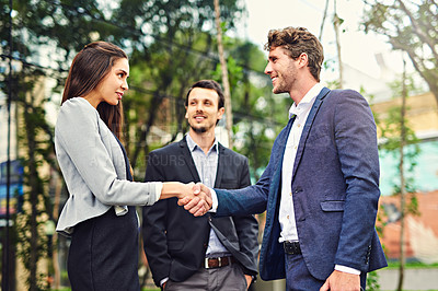 Buy stock photo Cropped shot of businesspeople meeting and greeting outside