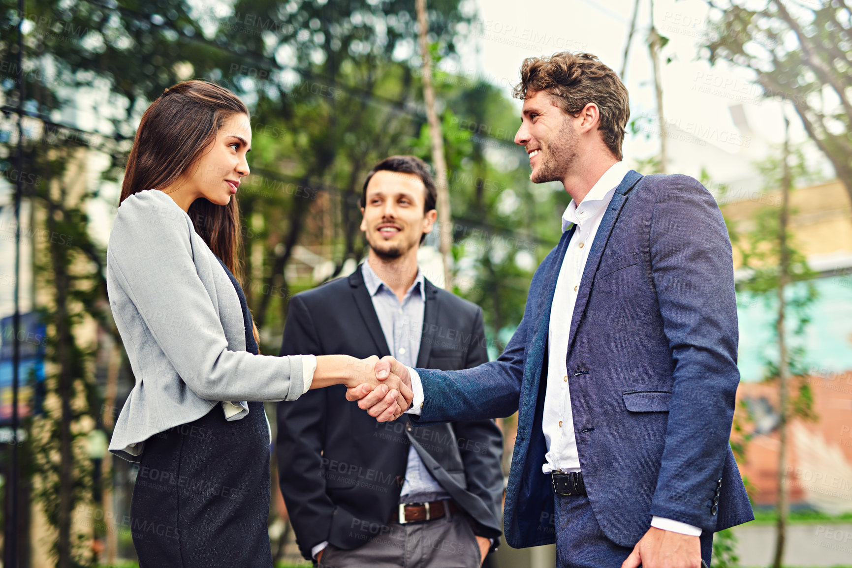 Buy stock photo Business, people and smile with handshake outdoor with welcome, greeting and introduction. Woman, man and happy as employees with shaking hands for collaboration, partnership or agreement on deal