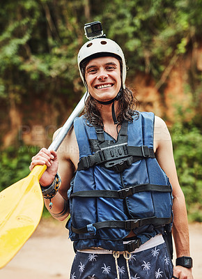 Buy stock photo Outdoor, paddle and man with life jacket, hobby and helmet for safety, vacation and happy in summer. Woods, joy and person in holiday, travel and protection in wilderness and camera for adventure