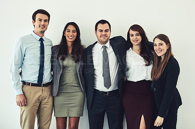Buy stock photo Studio shot of a group of confident young businesspeople standing together