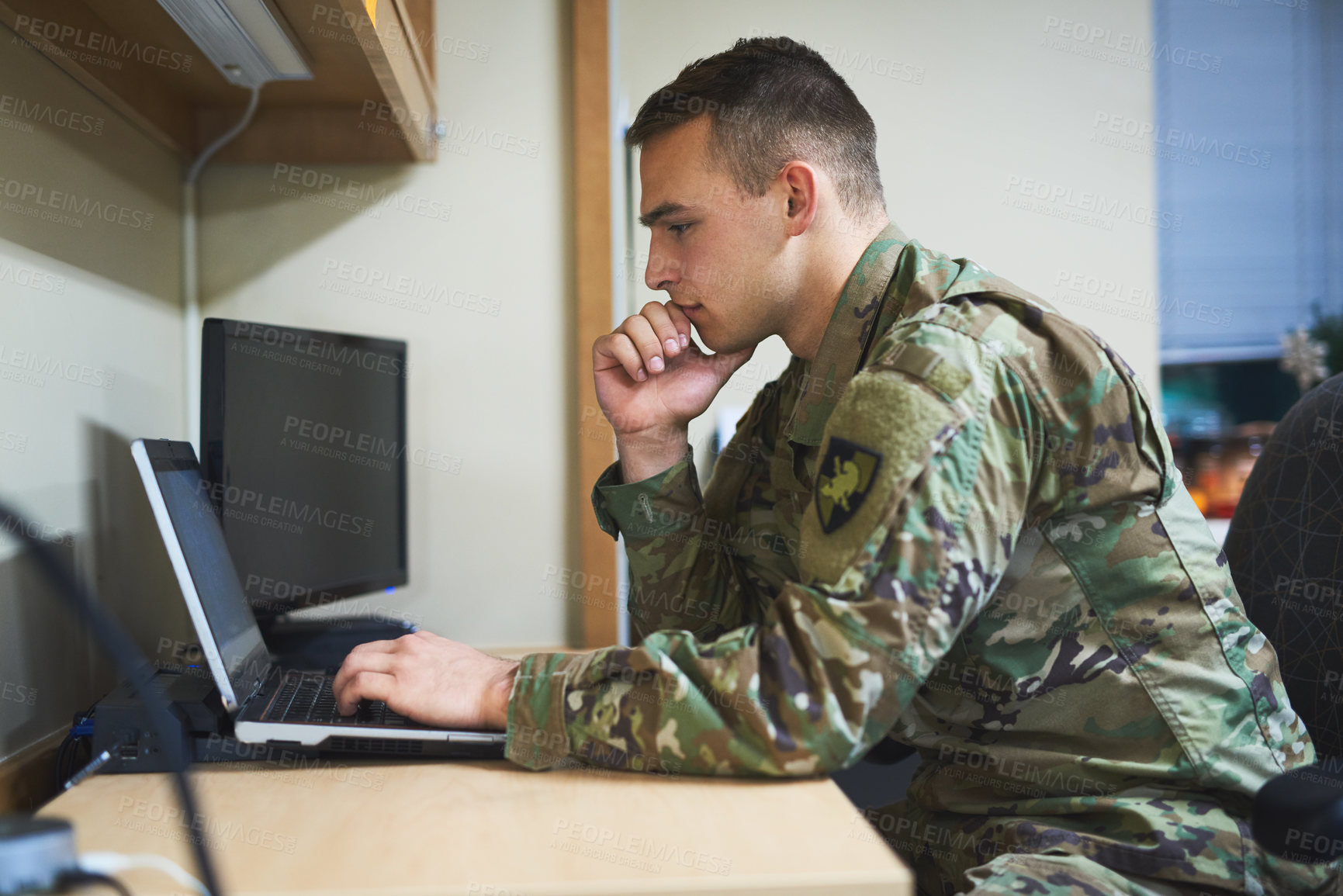 Buy stock photo Laptop, thinking and military man with security software, online research and law academy in office. Planning, soldier or young army person on computer, internet search or website information check
