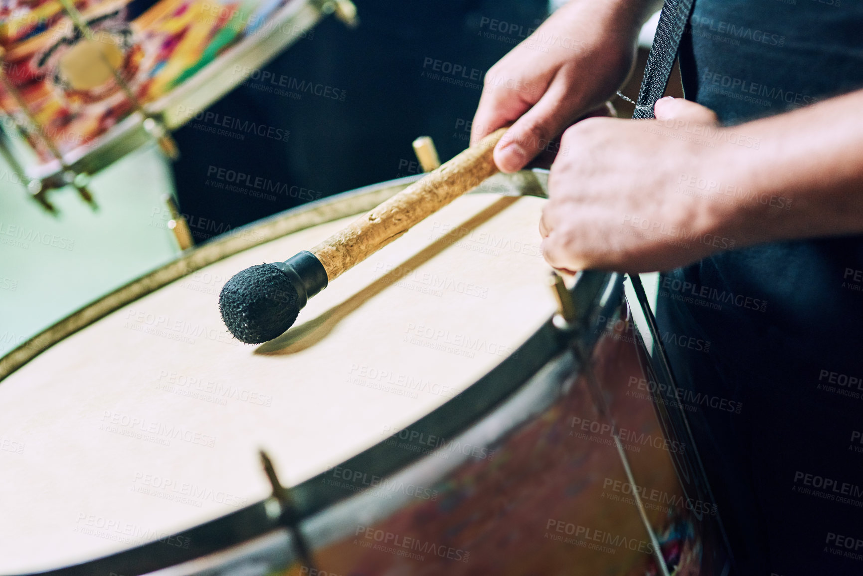 Buy stock photo Cropped shot of a group of unrecognizable male drummers playing at Carnival