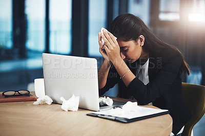 Buy stock photo Shot of a young businesswoman looking unwell in an office