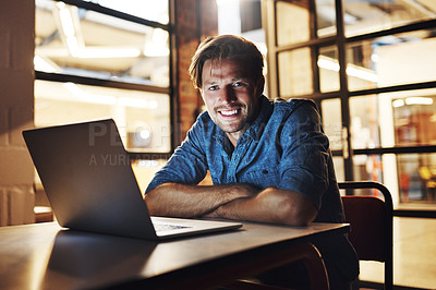 Buy stock photo Laptop, night and portrait of man, smile and web developer in office, dark and working on deadline. Face, employee and computer for project, creative and happy for assignment, business and online