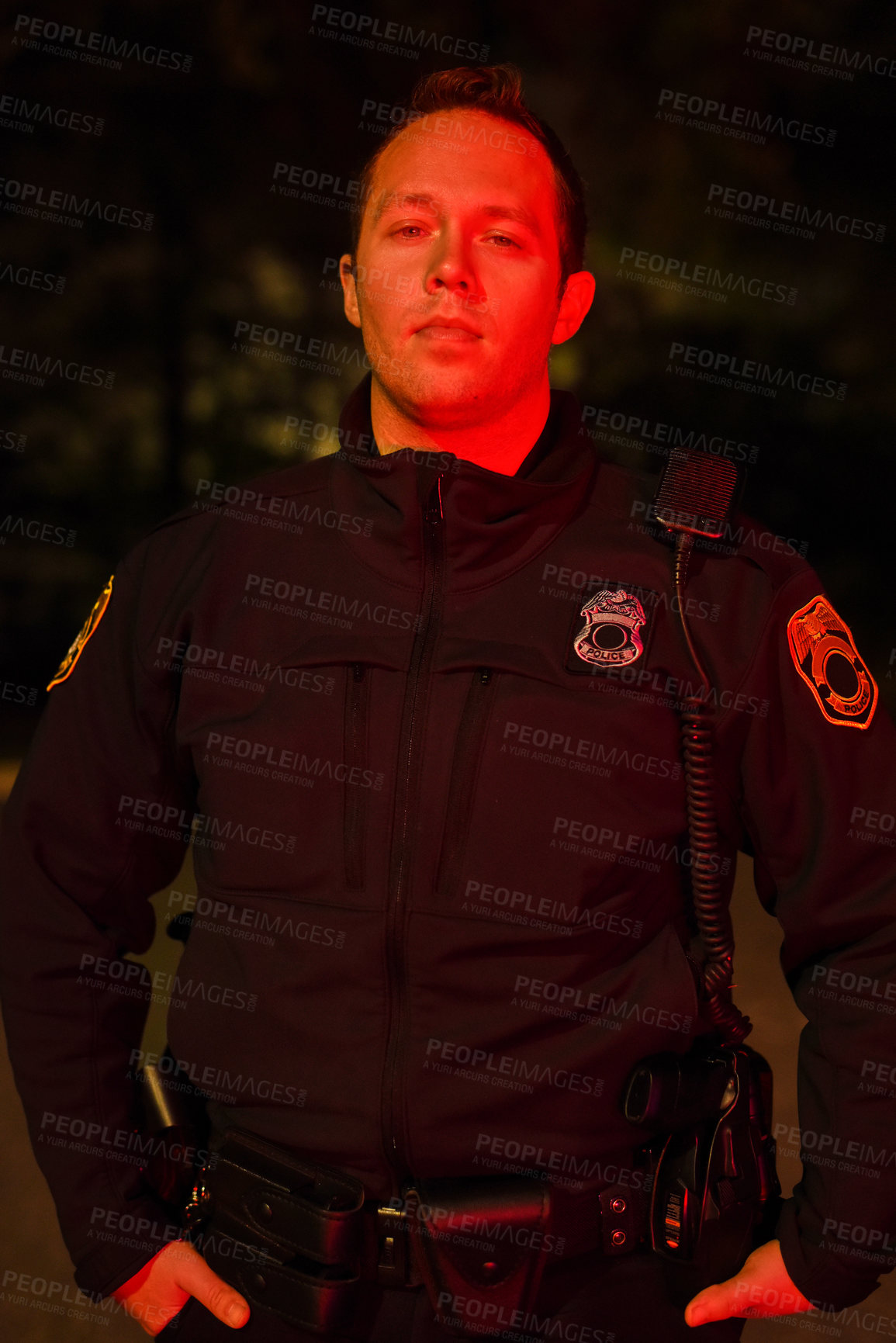 Buy stock photo Cropped portrait of a handsome young policeman out on patrol