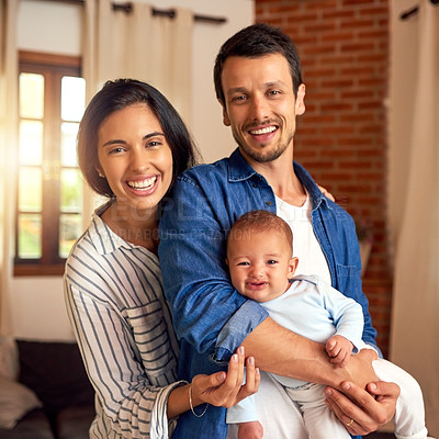 Buy stock photo Cropped portrait of an affectionate young couple and their baby boy at home