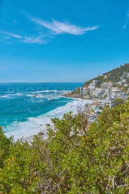 Buy stock photo Scenic seascape of Clifton beach, Cape Town, South Africa with hotels and holiday houses situated on a beachfront.  Beautiful rock outcrops of mountaintops and nature near the coastline or bay
