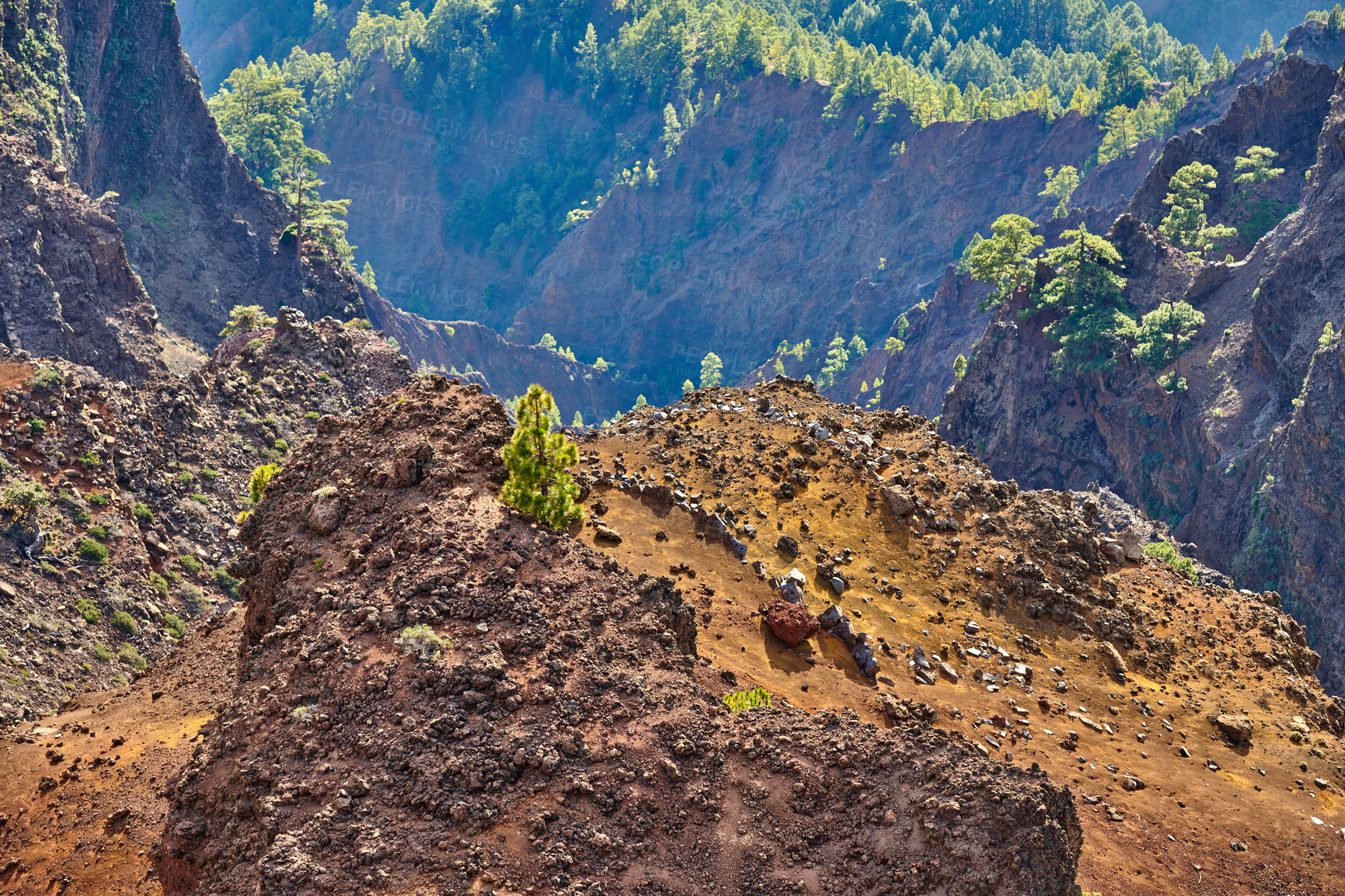 Buy stock photo Rocky landscape of mountains and hills in the remote area of La Palma, Canary Islands, Spain. Scenic view of mother nature, dirt and flora. Serene, tranquil, calm, zen, beauty in nature