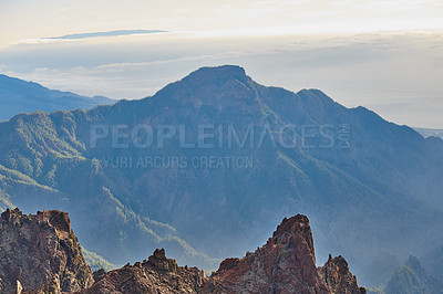 Buy stock photo Rocky landscape of mountains and hills in the remote area of La Palma, Canary Islands, Spain. Scenic view of mother nature, dirt and flora. Serene, tranquil, calm, zen, beauty in nature