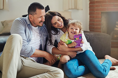 Buy stock photo Happy family, toddler or parents laughing with crayons and smile for bonding or child development. Mother, father and kid playing with dad, mom or people with toys, love and care for support together