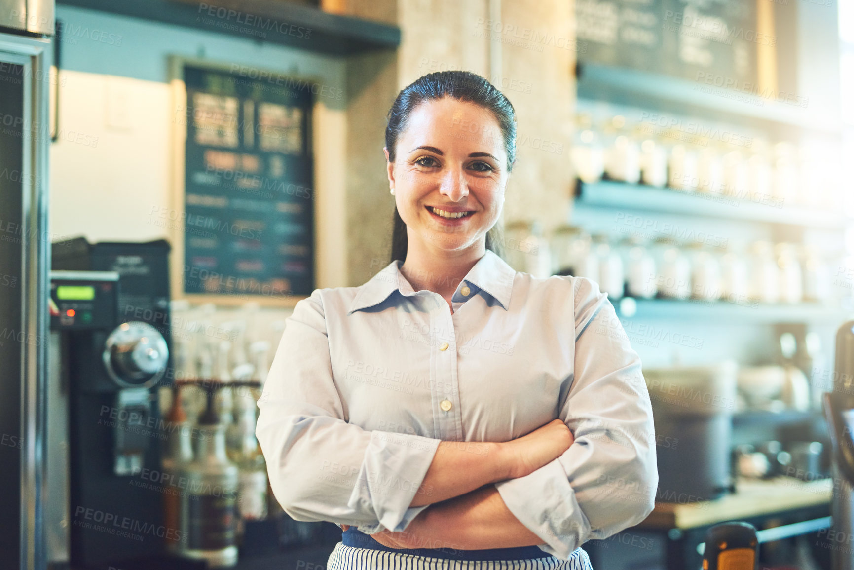 Buy stock photo Portrait of a young woman working in a cafe