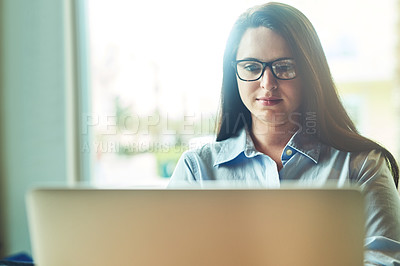 Buy stock photo Woman, laptop and glasses at cafe for writing email, freelance copywriter and research for article. Female person, reflection and reading website for info, coffee shop and internet for remote work