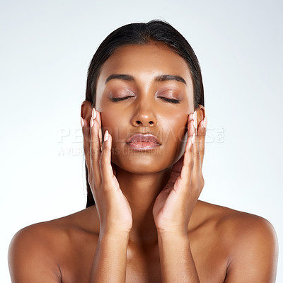 Buy stock photo Studio, face and beauty with Indian woman, hands and cosmetic or makeup. Cosmetology, skin or confidence for female model, dermatology and salon or spa treatment for skincare or wellness for selfcare