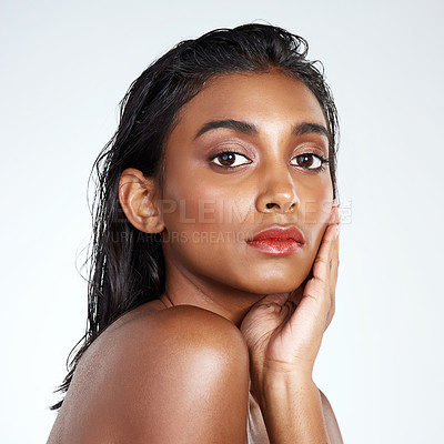 Buy stock photo Studio, beauty and portrait of Indian woman with makeup and skincare in mockup space. Model, face and girl with confidence from healthy dermatology or pride from cosmetics in white background
