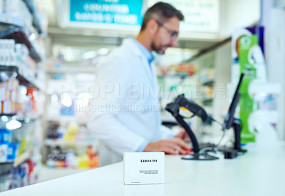 Buy stock photo Pharmacy, medication and man pharmacist with box in dispensary for pills prescription. Package, medical and closeup of male medicine dispenser with tablets on health insurance in retail chemist.