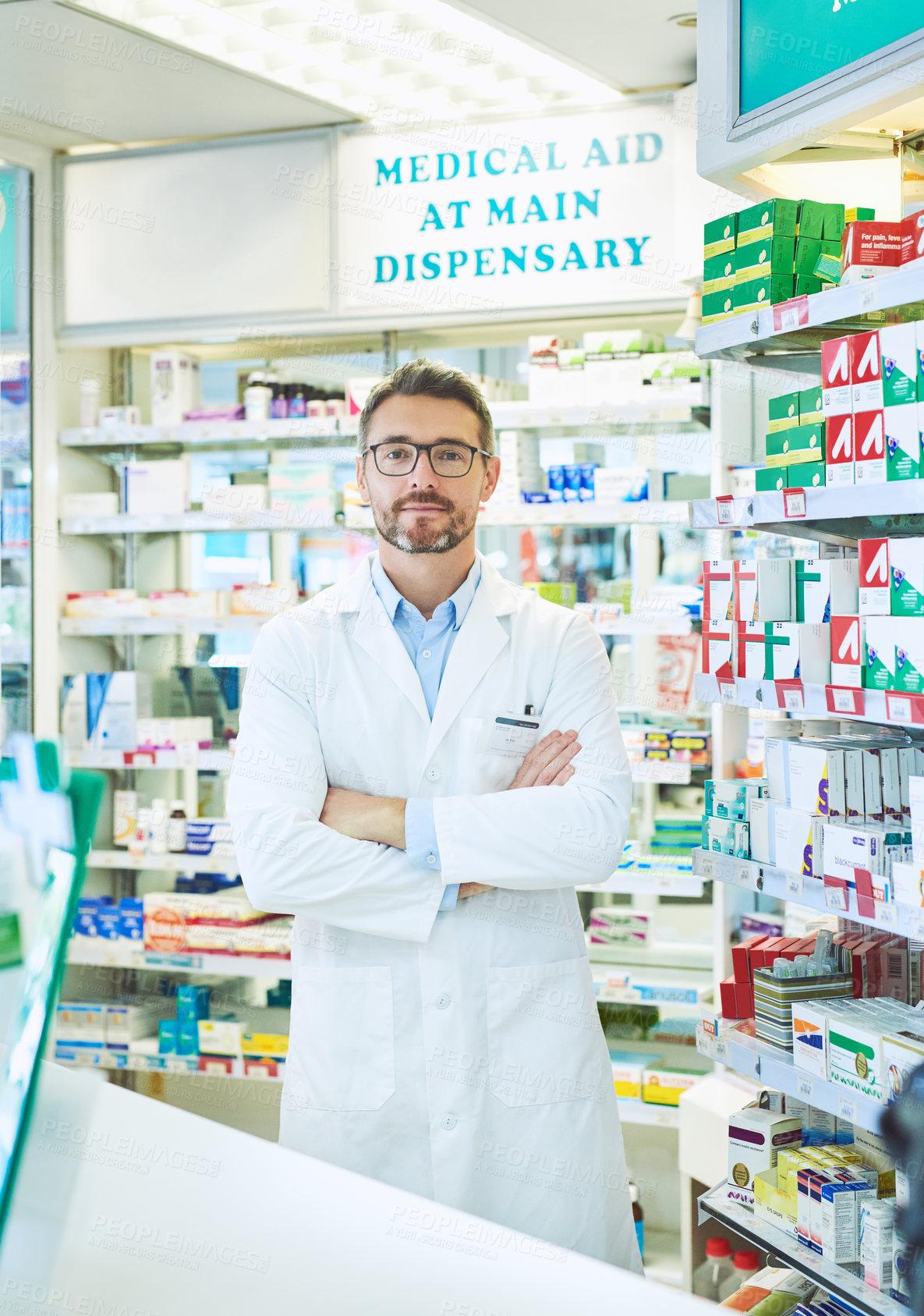 Buy stock photo Portrait of a confident mature pharmacist working in a pharmacy