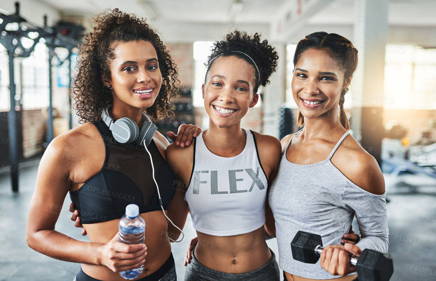 Buy stock photo Shot of a group of happy young women enjoying their time together at the gym