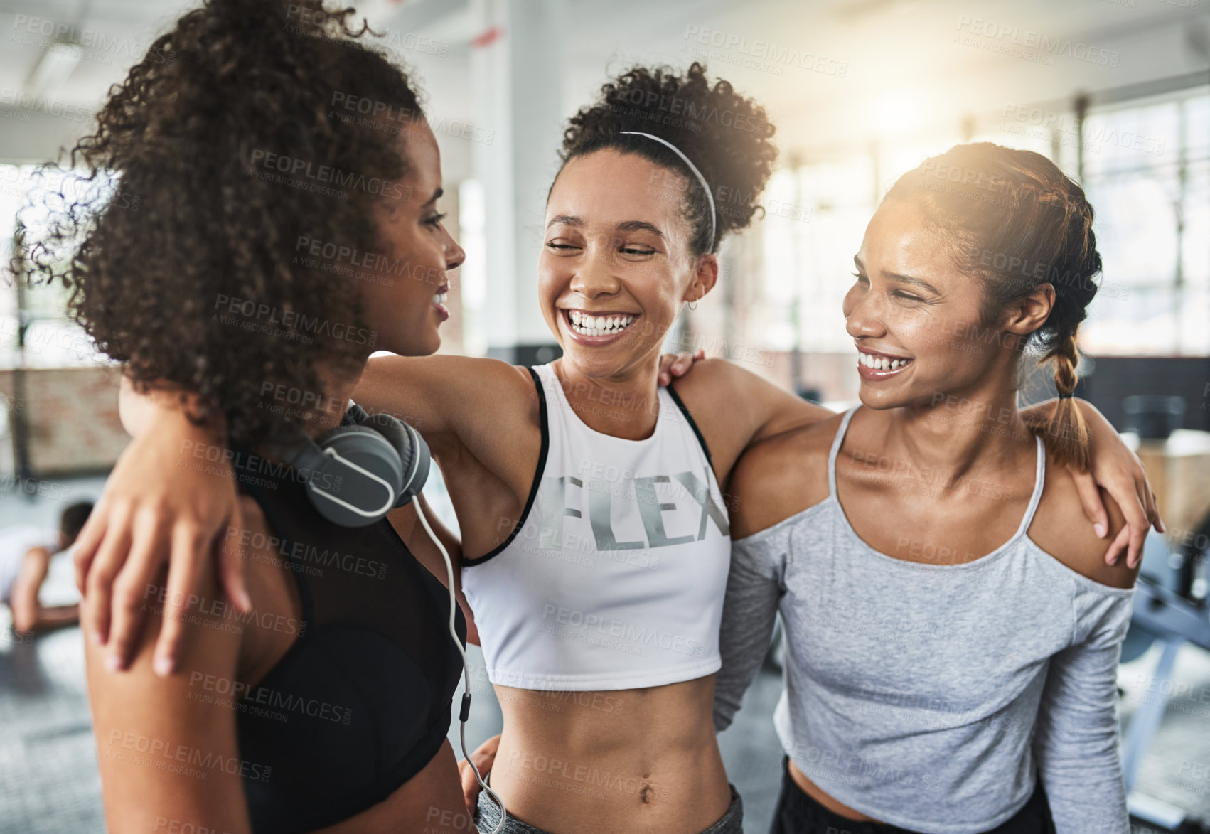 Buy stock photo Shot of a group of happy young women enjoying their time together at the gym