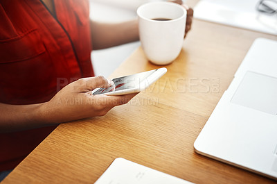 Buy stock photo Woman, coffee or hands with phone in home office for social media, internet post or mobile notification. Digital nomad, remote work or above of freelancer texting online for networking on tea break