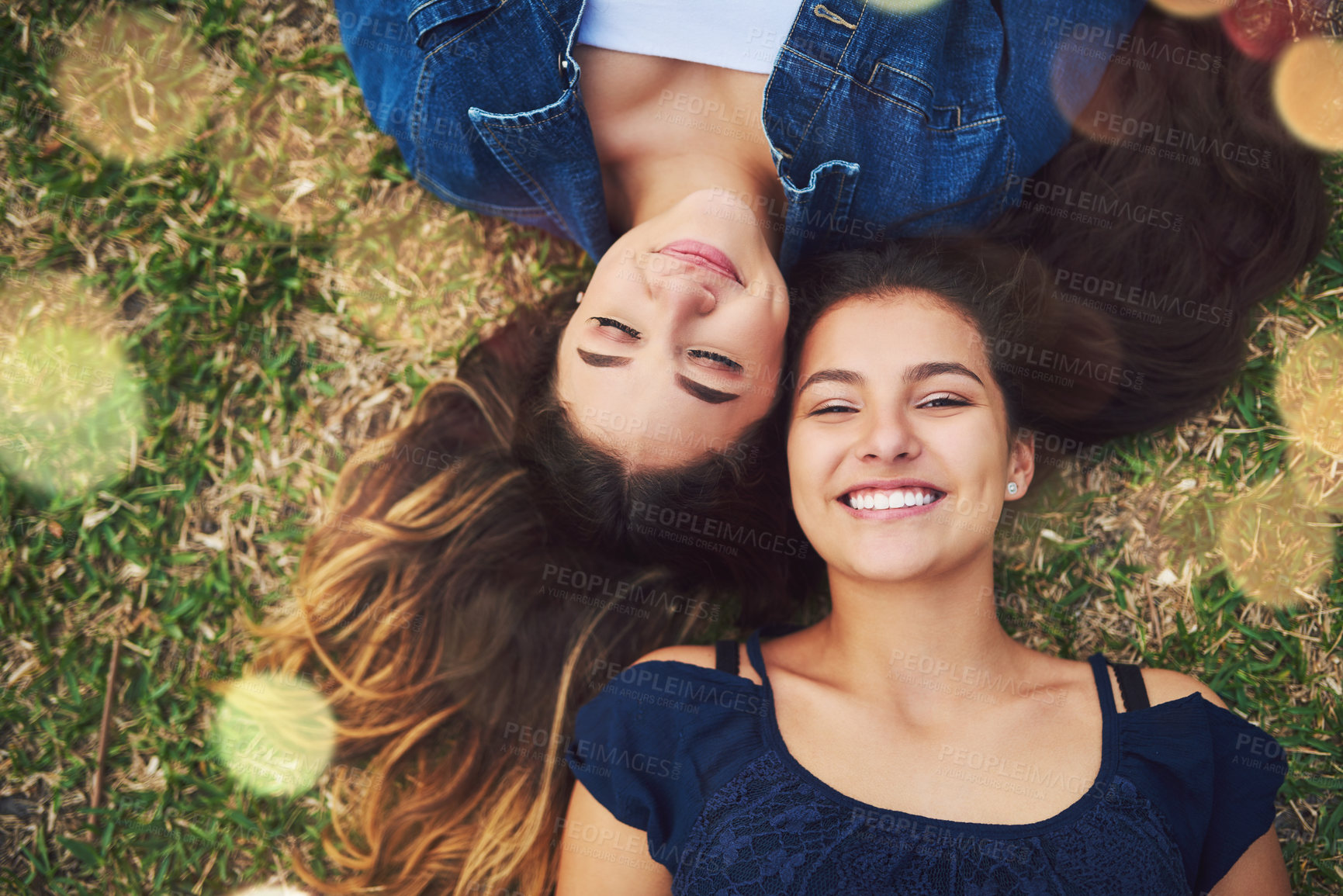 Buy stock photo Teen, friends and park portrait with student, love and care together on summer holiday and school break. Garden, lawn and lying on grass with young, happy and women smile outdoor on vacation above