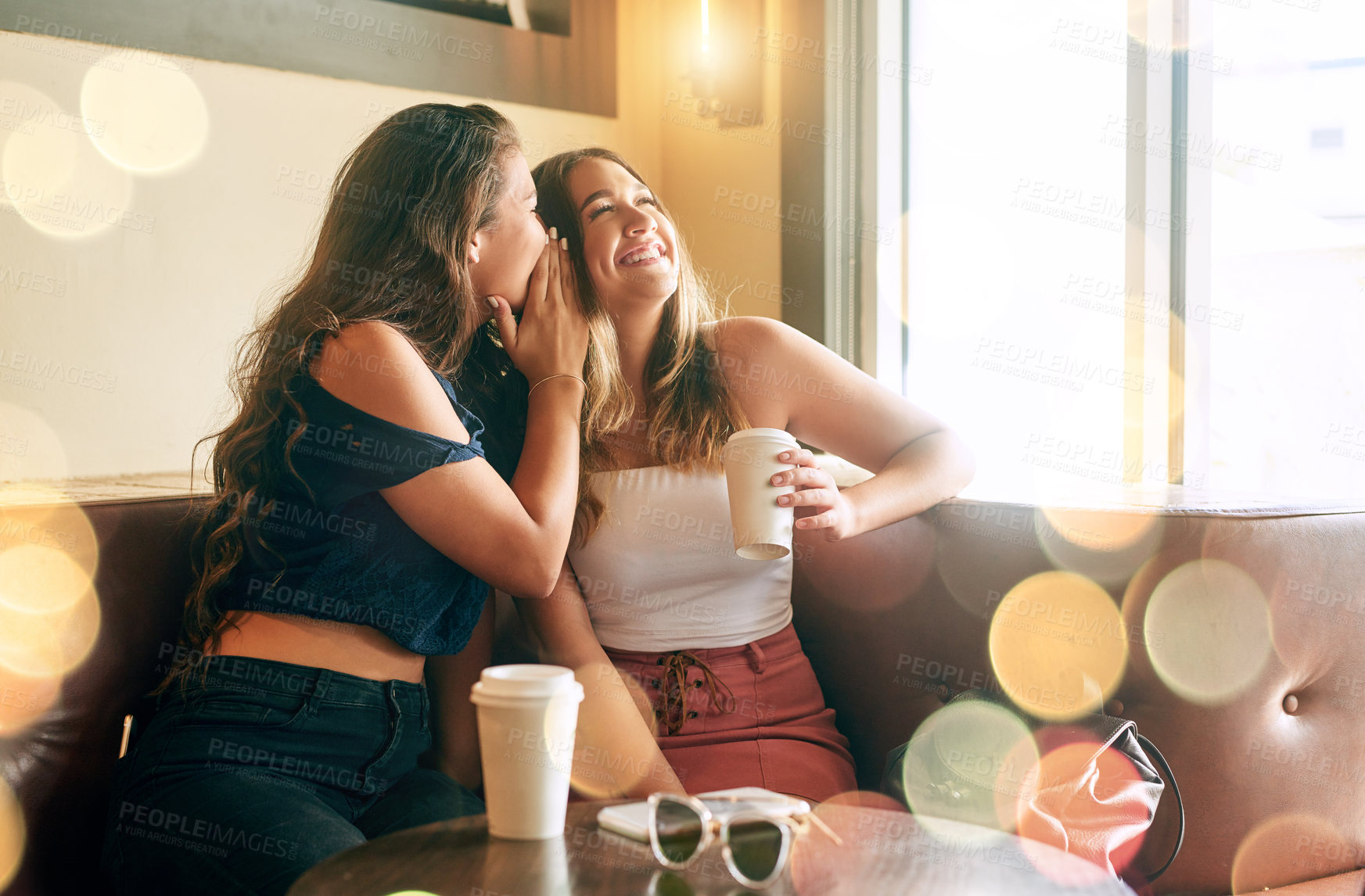 Buy stock photo Women, friends and bonding with gossip, laughing or secret in cafe for weekend, holiday or trip. Female people, together and talking in bokeh, restaurant or coffee shop for relax, conversation or fun