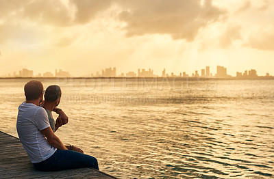 Buy stock photo Cropped shot of an affectionate mature couple spending the day by the beach