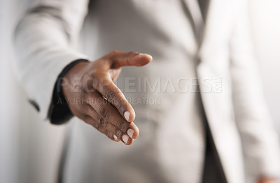 Buy stock photo Closeup shot of an unrecognizable businessman extending a handshake