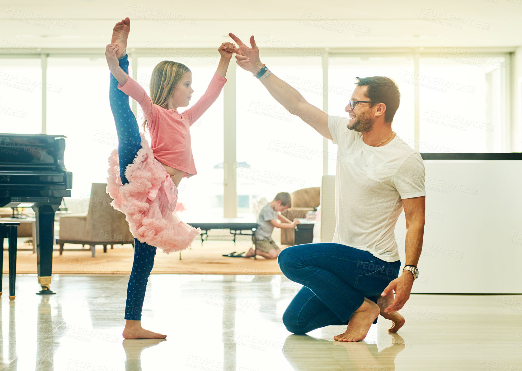 Buy stock photo Full length shot of a mature man helping his daughter practice for her ballet recital