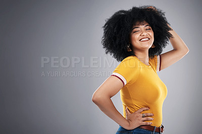 Buy stock photo Woman, clothes and afro of fashion, pride and smile for tshirt, stylish and confidence of girl. Aesthetic, happy and female person in dark background, relax and hair for model, cheerful and studio