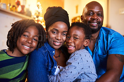 Buy stock photo Shot of a family of four spending the day at home