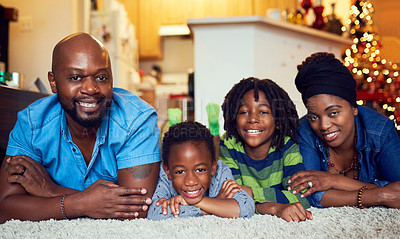 Buy stock photo Shot of a family of four spending the day at home