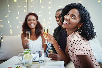 Buy stock photo Cropped shot of a group of young friends enjoying a night out