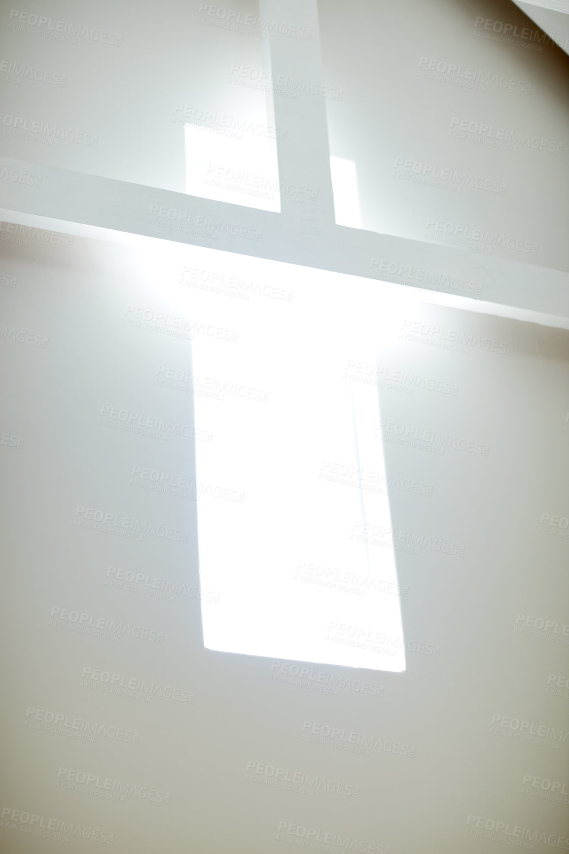 Buy stock photo Low angle shot of light coming through a window of a modern design window