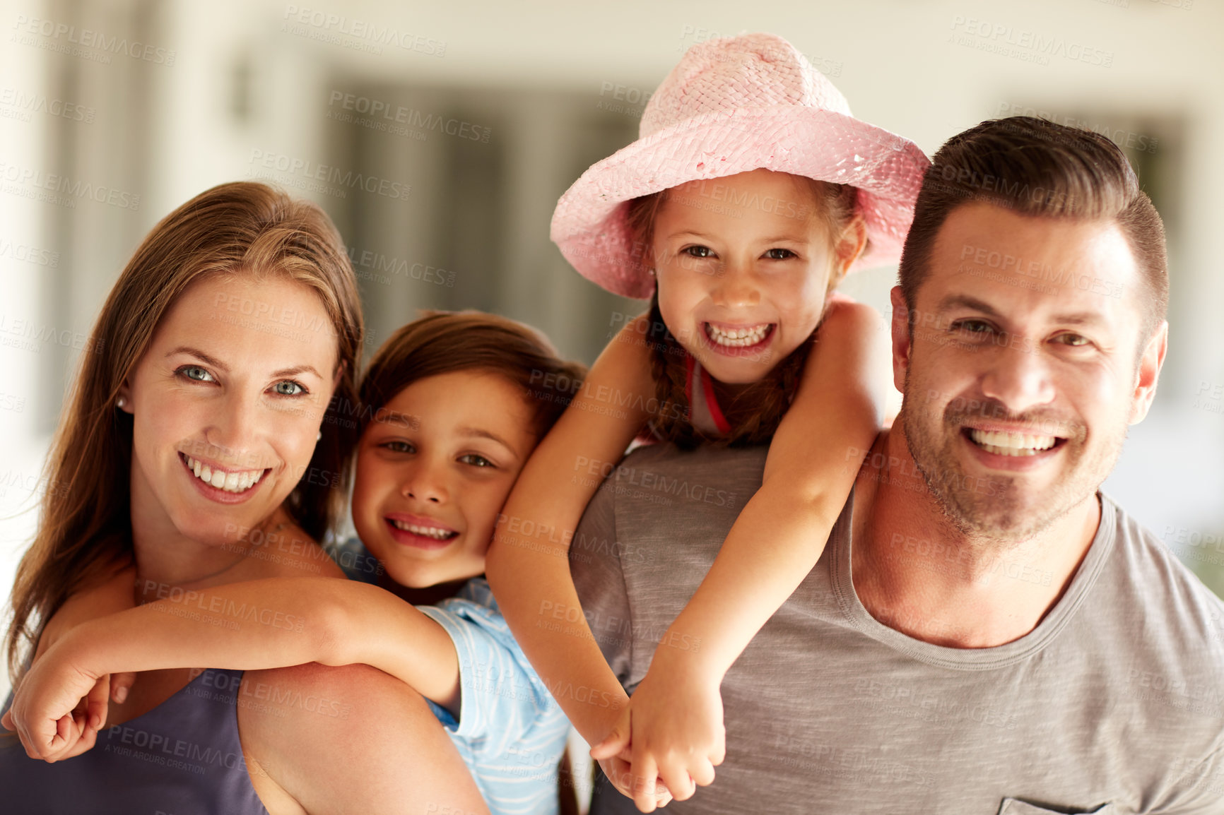 Buy stock photo Shot of a family of four spending quality time together at home