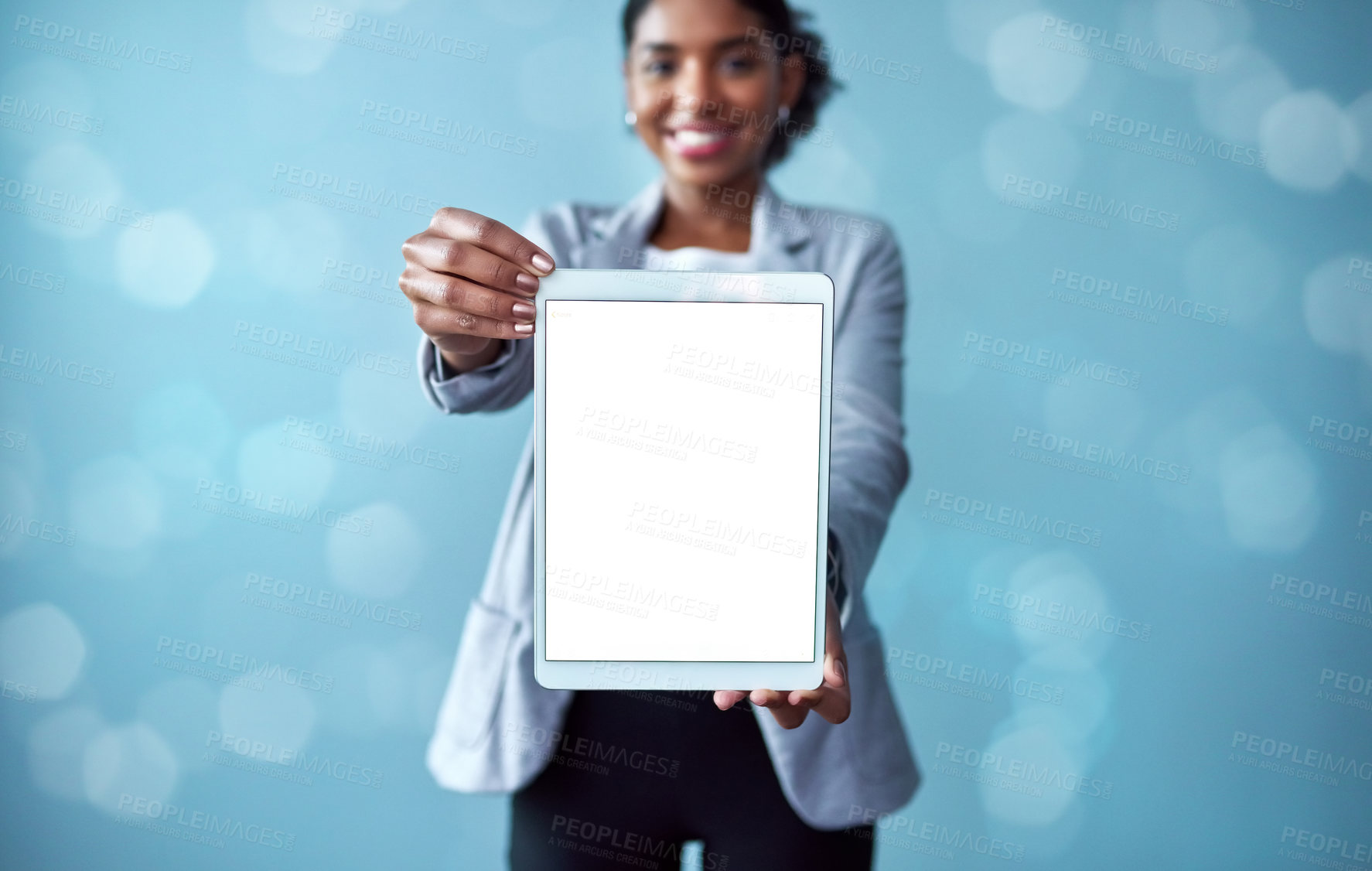 Buy stock photo Blank screen and copyspace on a tablet screen with a woman showing a digital device. Closeup of female hands holding tech product. Portrait of a smiling person posing with and embracing technology
