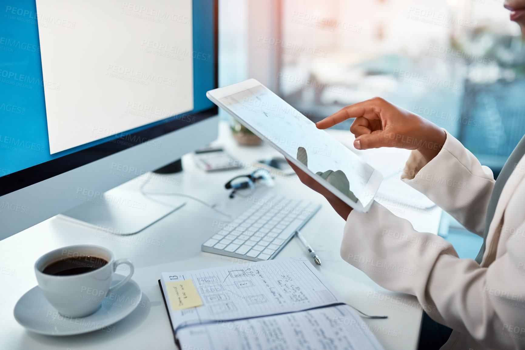 Buy stock photo Professional business woman holding a tablet, doing research and looking for new ideas for a project online on the internet in an office at work. Employee typing, scrolling and searching on the web