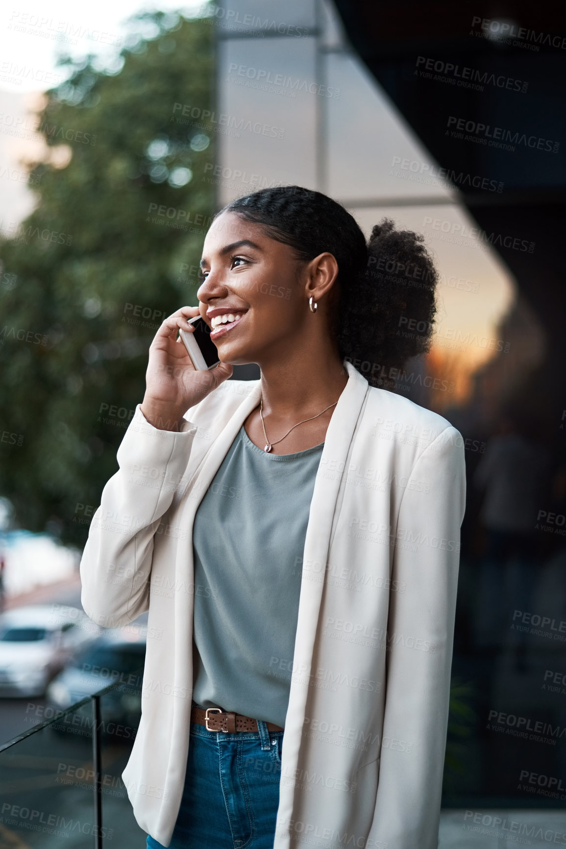 Buy stock photo Communication, phone and happy woman having a conversation with a business contact while standing outside. Confident female entrepreneur getting good news about job offer opportunity while on a call