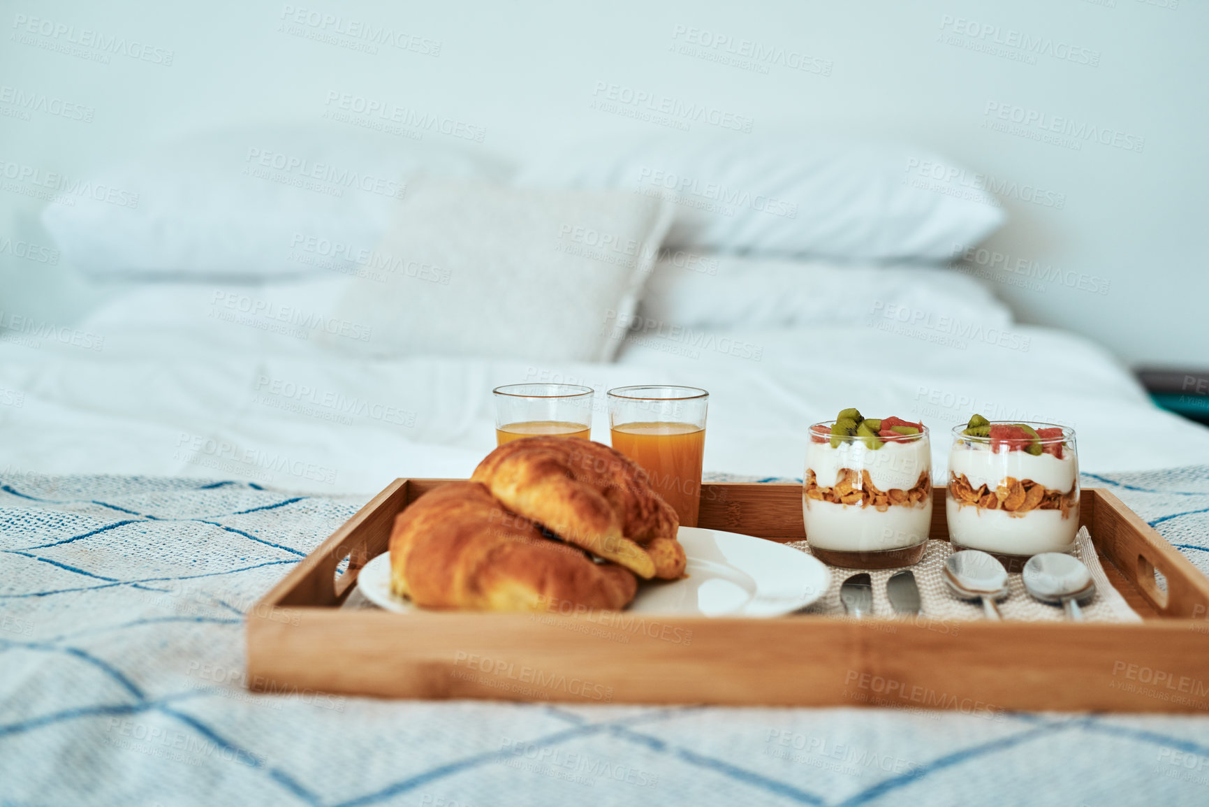 Buy stock photo Cropped shot of a healthy breakfast on a serving tray on a bed