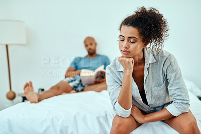 Buy stock photo Couple, woman and ignore on bed with conflict in marriage for infidelity, argument and insecure in home. People, frustrated and fight for toxic relationship, divorce and drama in bedroom for cheating