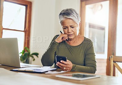 Buy stock photo Senior woman, budget planning and mobile savings checklist with phone at home. Pension, contract and elderly female person with debt, online tax and paper form in a house with bills and web admin