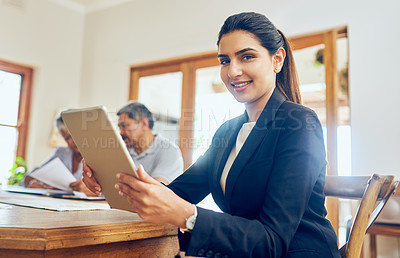 Buy stock photo Portrait of a young consultant meeting with a mature couple at their home