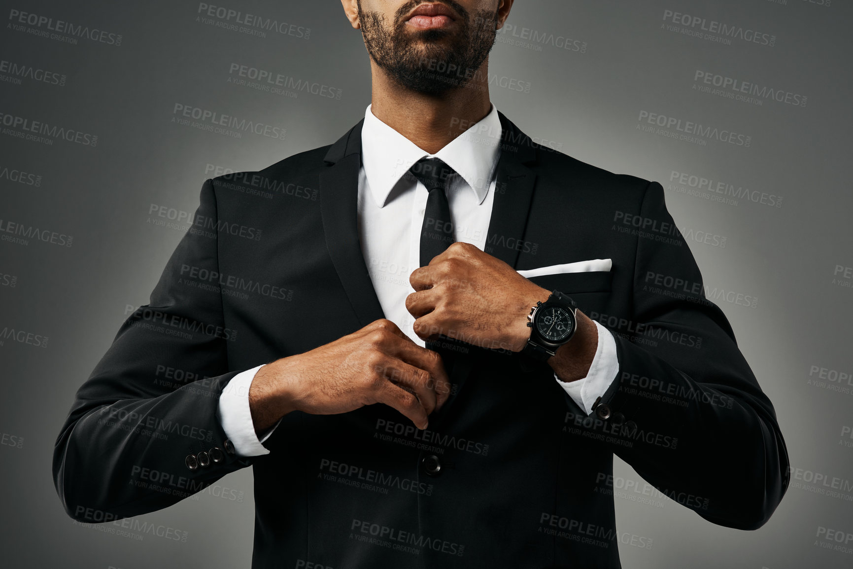 Buy stock photo Studio shot of a stylish unrecognizable businessman against a gray background