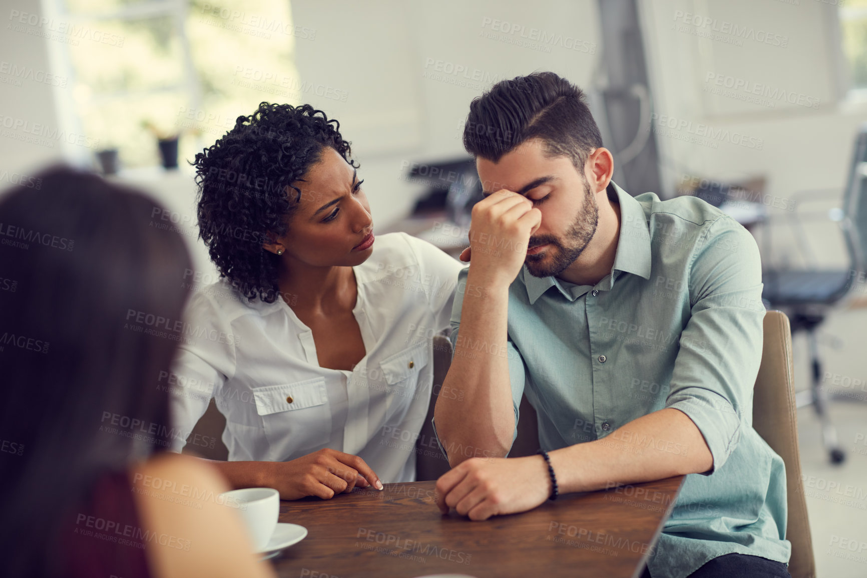 Buy stock photo Couple, support and man with stress in office for counseling, kindness and help in marriage. Frustrated, person and woman with therapy by table for confession, mistake and empathy in bad news