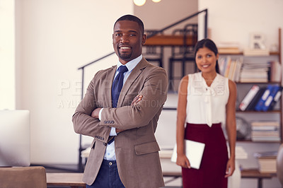 Buy stock photo Portrait of two businesspeople standing in an office