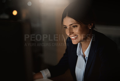 Buy stock photo Smile, thinking and woman in dark office with computer for research, website review or networking. Reading, internet and businesswoman at desk with online report, article or checking email at night