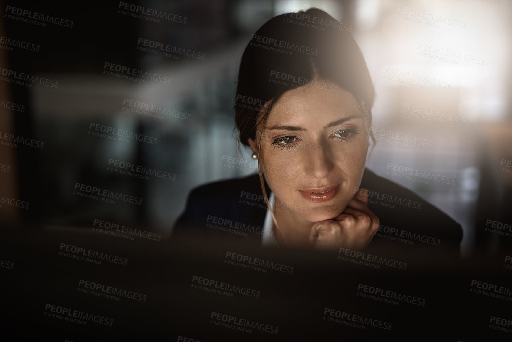 Buy stock photo Thinking, overtime and business woman in modern office reading email, proposal or problem solving at start up. Night work, ideas and time management, corporate worker at desk working on online report